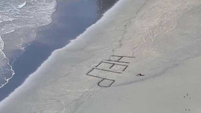 Surfista se perdeu depois de caminhar por cerca de duas horas e usou as últimas forças para escrever a mensagem.